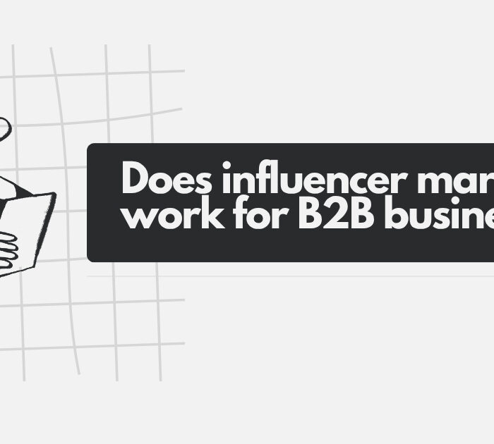 B2B executives analyzing influencer marketing campaign data on dashboard